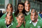2 February 2002; Model Natasha Byram, from Dublin, with Clontarf rugby players Paul Ryan, Robert Ryan, Conor Redmond and John O'Driscoll at a photocall to announce that Guinness, official beer sponsors to the Irish team rugby team, will distribute 10,000 facemask look-alikes of Irish rugby legend Peter Clohessy to supporters heading to the Ireland and Wales Six Nations Championship match at Lansdowne Road. Photo by Ray McManus/Sportsfile