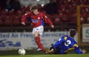 1 February 2002; Richie Baker of Shelbourne in action against Wes Byrne of Longford Town during the Eircom League Premier Division match between Shelbourne and Longford Town at Tolka Park in Dublin. Photo by David Maher/Sportsfile