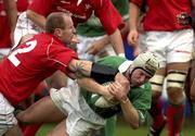 2 February 2002; Neil Doak of Irealnd beats the tackle of Gareth Thomas of Wales during the &quot;A&quot; Rugby International match between Ireland A and Wales A at Musgrave Park in Cork. Photo by Brendan Moran/Sportsfile