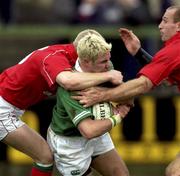 2 February 2002; Paddy Wallace of Ireland is tackled by Tom Shanklin, left, and Gareth Thomas of Wales during the &quot;A&quot; Rugby International match between Ireland A and Wales A at Musgrave Park in Cork. Photo by Brendan Moran/Sportsfile