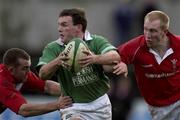 2 February 2002; John Kelly of Ireland is tackled by Leigh Jarvis, left, and Tom Shanklin of Wales during the &quot;A&quot; Rugby International match between Ireland A and Wales A at Musgrave Park in Cork. Photo by Brendan Moran/Sportsfile