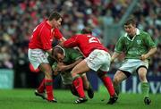 3 February 2002; Peter Clohessy of Ireland is tackled by Andy Marinos, 21, and Iestyn Harris of Wales during the Lloyds TSB Six Nations Championship match between Ireland and Wales at Landsdowne Road in Dublin. Photo by Brendan Moran/Sportsfile