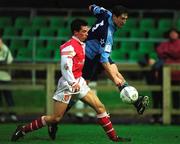 3 February 2002; Clive Delaney of UCD in action against Ger McCarthy of St. Patrick Athletic during the Eircom League Premier Division match between UCD and St Patrick's Athletic at Belfield Park in UCD, Dublin. Photo by Pat Murphy/Sportsfile