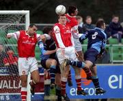 3 February 2002; Clive Delaney and Kevin Grogan of UCD in action against Paul Osam, Colm Foley and Darragh Magure of St. Patrick's Athletic during the Eircom League Premier Division match between UCD and St Patrick's Athletic at Belfield Park in UCD, Dublin. Photo by Pat Murphy/Sportsfile