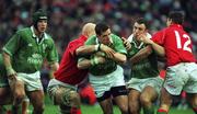 3 February 2002; Guy Easterby of Ireland in action against Nathan Budgett and Iestyn Harris, 12, of Wales during the Lloyds TSB Six Nations Championship match between Ireland and Wales at Landsdowne Road in Dublin. Photo by Matt Browne/Sportsfile