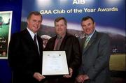 4 February 2002; Pictured at the AIB GAA Club of the Year Awards 2001 in Croke Park are Eugene Sheehy, Managing Director AIB, President of the GAA Sean McCague,  Frank McManus of Clontibret O'Neills who won the Monaghan Club of the Year Award at Croke Park in Dublin. Photo by Ray McManus/Sportsfile
