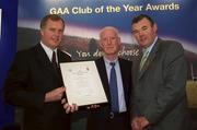 4 February 2002; Pictured at the AIB GAA Club of the Year Awards 2001 in Croke Park are Eugene Sheehy, Managing Director AIB, President of the GAA Sean McCague, Michael Donnelly of Ballinderry Shamrocks GAC who won the Derry Club of the Year Award at Croke Park in Dublin. Photo by Ray McManus/Sportsfile