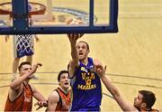 7 January 2017; Barry Drumm of UCD Marian goes for a layup ahead of Pyrobel Killester players, from left, Eoghain Kiernan, Ciaran Roe and Niall Hegarty during the Hula Hoops Men's National Cup semi-final match between Pyrobel Killester and UCD Marian at the Neptune Stadium in Cork. Photo by Brendan Moran/Sportsfile