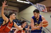 7 January 2017; Dustan Moreira of UCD Marian in action against Eoghain Kiernan of Pyrobel Killester during the Hula Hoops Men's National Cup semi-final match between Pyrobel Killester and UCD Marian at the Neptune Stadium in Cork. Photo by Eóin Noonan/Sportsfile