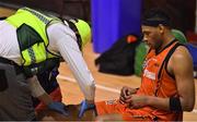7 January 2017; Jermaine Turner of Pyrobel Killester is attended to by medical personnel during the Hula Hoops Men's National Cup semi-final match between Pyrobel Killester and UCD Marian at the Neptune Stadium in Cork. Photo by Brendan Moran/Sportsfile