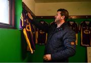 8 January 2017; Wexford kitman John Conroy hangs jerseys in the dressing room prior to the Bord na Mona Walsh Cup Group 3 Round 1 match between Wexford and UCD at Páirc Uí Suíochan in Gorey, Co. Wexford. Photo by Ramsey Cardy/Sportsfile