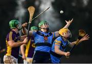8 January 2017; Johny Murphy, centre, and James Houlihan of UCD in action against Richie Kehoe of Wexford during the Bord na Mona Walsh Cup Group 3 Round 1 match between Wexford and UCD at Páirc Uí Suíochan in Gorey, Co. Wexford. Photo by Ramsey Cardy/Sportsfile