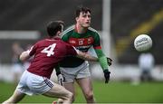 8 January 2017; Liam Irwin of Mayo in action against Aaron OConnor of NUIG during the Connacht FBD League Section A Round 1 match between Mayo and NUI Galway at Elvery's MacHale Park in Castlebar, Co. Mayo. Photo by David Maher/Sportsfile