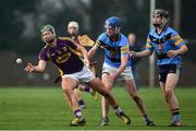 8 January 2017; Conor McDonald of Wexford in action against Ruairi Dwan of UCD during the Bord na Mona Walsh Cup Group 3 Round 1 match between Wexford and UCD at Páirc Uí Suíochan in Gorey, Co. Wexford. Photo by Ramsey Cardy/Sportsfile