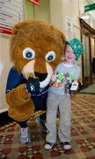 30 May 2011; The Leinster mascot Leo the Lion with Liam Nolan, from Robertstown, Co. Kildare, during a visit to Temple Street Children's University Hospital by members of the winning Heineken Cup team. The Children's University Hospital, Temple Street, Dublin. Picture credit: Ray McManus / SPORTSFILE
