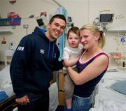 30 May 2011; Leinster's Eoin O'Malley with Daniel McClure and his mother Monica, from Blanchardstown, Dublin, during a visit to Temple Street Children's University Hospital by members of the winning Heineken Cup team. The Children's University Hospital, Temple Street, Dublin. Picture credit: Ray McManus / SPORTSFILE