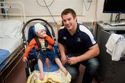 30 May 2011; Leinster's Sean O'Brien with two and a half year old Conor Quirke, from Galway City, during a visit to Temple Street Children's University Hospital by members of the winning Heineken Cup team. The Children's University Hospital, Temple Street, Dublin. Picture credit: Ray McManus / SPORTSFILE