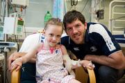 30 May 2011; Leinster's Shane Horgan with six and a half year old Isabelle Brown, from Navan Road, Dublin, during a visit to Temple Street Children's University Hospital by members of the winning Heineken Cup team. The Children's University Hospital, Temple Street, Dublin. Picture credit: Ray McManus / SPORTSFILE