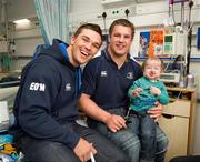 30 May 2011; Leinster's Eoin O'malley and Sean O'Brien with four year old Anthony Iannucli, from Sallynoggin, Dublin, during a visit to Temple Street Children's University Hospital by members of the winning Heineken Cup team. The Children's University Hospital, Temple Street, Dublin. Picture credit: Ray McManus / SPORTSFILE