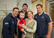 30 May 2011; Leinster's Eoin O'Malley, Shane Horgan and Sean O'Brien with Shane Mehigan, age 15 months, and his mother Venessa, from Campile, Wexford, during a visit to Temple Street Children's University Hospital by members of the winning Heineken Cup team. The Children's University Hospital, Temple Street, Dublin. Picture credit: Ray McManus / SPORTSFILE