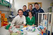 30 May 2011; Leinster's Eoin O'Malley, Sean O'Brien and Shane Horgan with Mark Sheehan, his mum Mary and dad Finbarr, from Glenville, Co. Cork, during a visit to Temple Street Children's University Hospital by members of the winning Heineken Cup team. The Children's University Hospital, Temple Street, Dublin. Picture credit: Ray McManus / SPORTSFILE