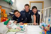 30 May 2011; Leinster's Eoin O'Malley, Sean O'Brien and Shane Horgan with Mark Sheehan, from Glenville, Co. Cork, during a visit to Temple Street Children's University Hospital by members of the winning Heineken Cup team. The Children's University Hospital, Temple Street, Dublin. Picture credit: Ray McManus / SPORTSFILE