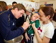 30 May 2011; Leinster's Brian O'Driscoll with Sean Swords and his mother Fiona, from Athenry, Co. Galway, during a visit to Temple Street Children's University Hospital by members of the winning Heineken Cup team. The Children's University Hospital, Temple Street, Dublin. Picture credit: Ray McManus / SPORTSFILE