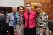 30 May 2011; Pictured at the 2011 Cadbury Hero of the Future Award's ceremony are, from left, Paul Geaney Snr., Eileen Geaney, Paul Geaney and Christina Geaney, from Kerry. Paul Geaney was one of 14 shortlisted players who excelled throughout the 2011 Cadbury GAA U21 Football Championship. The 2011 Cadbury Hero of the Future Award was won by Thomas Flynn from Galway. All nominees can be seen on www.cadburygaau21.com Past winners, Rory O’Carroll from Dublin, Colm O’Neill and Fintan Goold from Cork, Killian Young from Kerry and Keith Higgins from Mayo have gone on to represent their Counties at Senior level. 2011 Cadbury Hero of the Future Awards, Croke Park, Dublin. Picture credit: Pat Murphy / SPORTSFILE