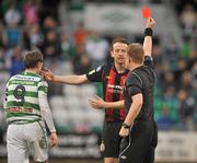 30 May 2011; Aidan Price, Bohemians, is shown a red card by referee Alan Kelly following his tackle on Gary Twigg, left, Shamrock Rovers. Airtricity League Premier Division, Shamrock Rovers v Bohemians. Tallaght Stadium, Tallaght, Co. Dublin. Picture credit: David Maher / SPORTSFILE