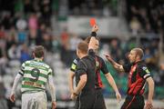 30 May 2011; Aidan Price, Bohemians, is shown a red card by referee Alan Kelly following his tackle on Gary Twigg, left, Shamrock Rovers. Airtricity League Premier Division, Shamrock Rovers v Bohemians. Tallaght Stadium, Tallaght, Co. Dublin. Picture credit: David Maher / SPORTSFILE