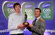 30 May 2011; Thomas Flynn from Galway, who won the 2011 Cadbury Hero of the Future Award, with Shane Guest, Cadbury Ireland. Thomas was one of 14 shortlisted players who had excelled throughout the 2011 Cadbury GAA U21 Football Championship, all nominees can be seen on www.cadburygaau21.com Past winners include Rory O’Carroll from Dublin, Colm O’Neill and Fintan Goold from Cork, Killian Young from Kerry and Keith Higgins from Mayo and all have gone on to represent their counties at senior level. Thomas, who plays his club football with St Mary’s Athenry was named as a Cadbury Hero of the Match for his performance against Cork in the All Ireland Semi Final. The judging panel which consisted of senior Kildare footballer Dermot Earley, former Dublin manager Paul Caffrey, TG4 journalist Michael O’Domhnaill and former Kerry and All Star player Darragh O’Se gave serious consideration to the public votes cast on cadburygaau21.com, but ultimately Thomas Flynn’s heroic performances in both the semi-final against Cork and the final against Cavan edged the competition out in the end. 2011 Cadbury Hero of the Future Awards, Croke Park, Dublin. Picture credit: Pat Murphy / SPORTSFILE