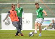 31 May 2011; Republic of Ireland's Simon Cox and Glenn Whelan in action during squad training ahead of their upcoming EURO2012 Championship Qualifier against Macedonia on Saturday. Republic of Ireland Squad Training, Gannon Park, Malahide, Co. Dublin. Picture credit: Oliver McVeigh / SPORTSFILE