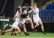 10 January 2017; Ben Griffin of Mount Temple is tackled by a host of Presentation College Bray players during the Bank of Ireland Fr Godfrey Cup Round 1 match between Presentation College Bray and Mount Temple at Donnybrook Stadium in Donnybrook, Dublin. Photo by Cody Glenn/Sportsfile