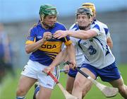 1 June 2011; John O'Neill, Tipperary, in action against Philip Mahony, Waterford. Bord Gáis Energy Munster GAA Hurling Under 21 Championship, Quarter-Final, Tipperary v Waterford, Semple Stadium, Thurles, Co Tipperary. Picture credit: Matt Browne / SPORTSFILE
