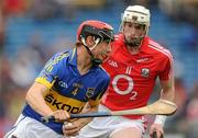 29 May 2011; Kevin Maher, Tipperary, in action against Michael O'Sullivan, Cork. Munster GAA Hurling Intermediate Championship, Quarter-Final, Tipperary v Cork, Semple Stadium Thurles, Co. Tipperary. Picture credit: Stephen McCarthy / SPORTSFILE
