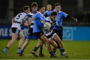 11 January 2017; Andy McDonnell of UCD in action against Niall Scully and Maitias Mac Donncha of Dublin, right, during the Bord na Mona O'Byrne Cup Group 1 Round 2 match between Dublin and UCD at Parnell Park in Dublin. Photo by Piaras Ó Mídheach/Sportsfile