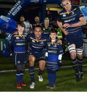 13 January 2017; Leinster match day mascots Niall Finn, from Garristown, Dublin, left, and Andrew Tierney, from Willow Park School, Blackrock, Dublin, with captain Isa Nacewa ahead of the European Rugby Champions Cup Pool 4 Round 5 match between Leinster and Montpellier at the RDS Arena in Dublin. Photo by Ramsey Cardy/Sportsfile