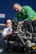 14 January 2017; Coach Declan Slevin with Robbie O'Sullivan as he tries out the hand cycling during the Irish Paralympic Sport Expo at the National Sports Campus in Abbotstown, Dublin.  Photo by Eóin Noonan/Sportsfile