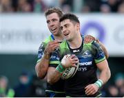 14 January 2017; Tiernan O’Halloran of Connacht is congratulated by team-mate Craig Ronaldson after scoring his side's third try during the European Rugby Champions Cup pool 2 round 5 match between Connacht and Zebre at the Sportsground in Galway. Photo by Seb Daly/Sportsfile
