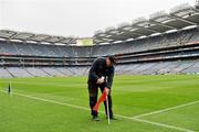 5 June 2011; A general view of a Croke Park groundsman putting in a sideline flag before the game. Leinster GAA Football Senior Championship Quarter-Final, Kildare v Meath, Croke Park, Dublin. Picture credit: Barry Cregg / SPORTSFILE