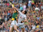 5 June 2011; Graham Reilly, Meath, jumps for a high ball with Michael Foley, Kildare. Leinster GAA Football Senior Championship Quarter-Final, Kildare v Meath, Croke Park, Dublin. Picture credit: Barry Cregg / SPORTSFILE