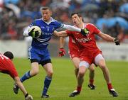 5 June 2011; Mark Downey, Monaghan, in action against Sean Cavanagh, Tyrone. Ulster GAA Football Senior Championship Quarter-Final, Healy Park, Tyrone v Monaghan, Omagh, Co. Tyrone. Picture credit: Oliver McVeigh / SPORTSFILE