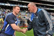 5 June 2011; Dublin manager Pat Gilroy, right, shakes hands with Laois manager Justin McNulty after the game. Leinster GAA Football Senior Championship Quarter-Final, Laois v Dublin, Croke Park, Dublin. Picture credit: Barry Cregg / SPORTSFILE