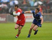 5 June 2011; Brian McGuigan, Tyrone, in action against Dessie Mone, Monaghan. Ulster GAA Football Senior Championship Quarter-Final, Healy Park, Tyrone v Monaghan, Omagh, Co. Tyrone. Picture credit: Oliver McVeigh / SPORTSFILE