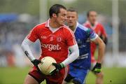 5 June 2011; Brian McGuigan, Tyrone, in action against Conor Galligan, Monaghan. Ulster GAA Football Senior Championship Quarter-Final, Healy Park, Tyrone v Monaghan, Omagh, Co. Tyrone. Picture credit: Oliver McVeigh / SPORTSFILE