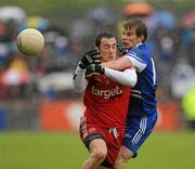 5 June 2011; Brian McGuigan, Tyrone, in action against Donal Morgan, Monaghan. Ulster GAA Football Senior Championship Quarter-Final, Healy Park, Tyrone v Monaghan, Omagh, Co. Tyrone. Picture credit: Oliver McVeigh / SPORTSFILE
