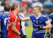 5 June 2011; Owen Mulligan, Tyrone, in dispute with Colin Walshe, Monaghan. Ulster GAA Football Senior Championship Quarter-Final, Healy Park, Tyrone v Monaghan, Omagh, Co. Tyrone. Picture credit: Oliver McVeigh / SPORTSFILE