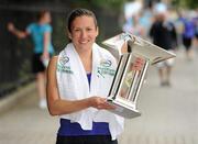 6 June 2011; Donegal's Catriona Jennings lifts the trophy after winning the 2011 Flora Womens Mini Marathon. 2011 Flora Womens Mini Marathon, Dublin City. Picture credit: Pat Murphy / SPORTSFILE