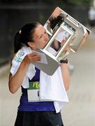 6 June 2011; Donegal's Catriona Jennings kisses the trophy after winning the 2011 Flora Womens Mini Marathon. 2011 Flora Womens Mini Marathon, Dublin City. Picture credit: Pat Murphy / SPORTSFILE