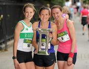 6 June 2011; Donegal's Catriona Jennings with the trophy after winning the 2011 Flora Womens Mini Marathon alongside second placed Siobhan O'Doherty, Nenagh, Co. Tipperary, right, and third placed Aoife Talty, Dublin, left. 2011 Flora Womens Mini Marathon, Dublin City. Picture credit: Pat Murphy / SPORTSFILE